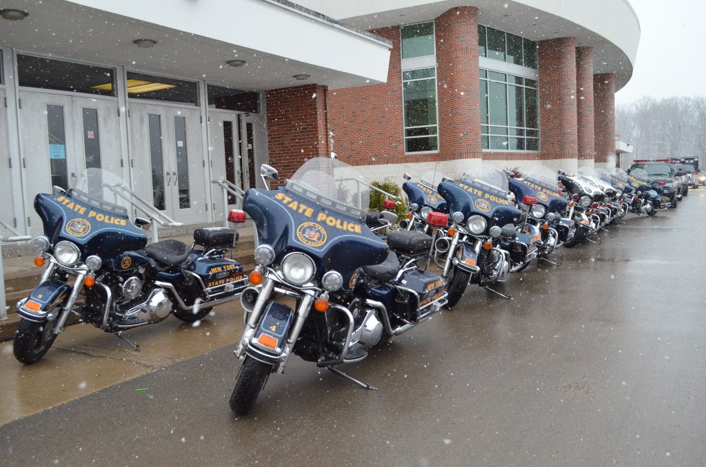 ST. BONAVENTURE, N.Y. (Nov. 26, 2013) ––&nbsp;Law enforcement vehicles flooded the university's campus for Trooper Ross Riley's funeral.