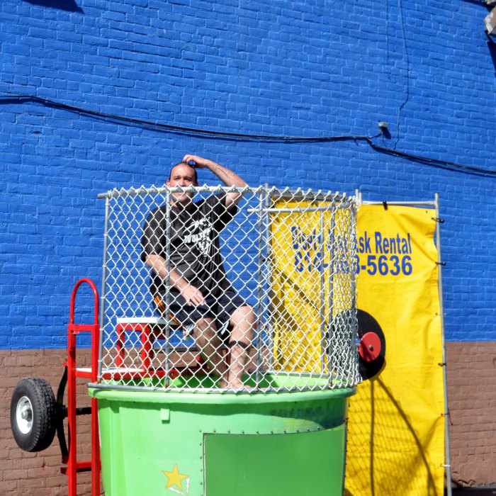 Chris Brown, director of the First-Year Experience program at St. Bonaventure, takes his turn in the dunk tank, with all proceeds benefiting student veterans.